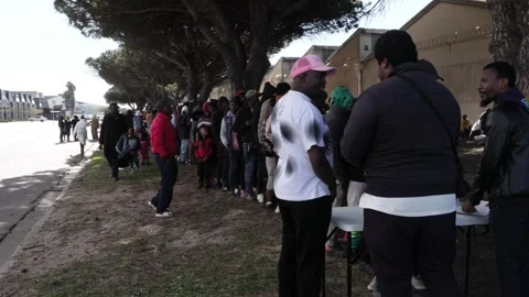Foreign nationals queue for repatriation Stock Footage 339501333