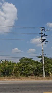 Foreign object debris hanging on high voltage overhead ground wire OHGW. Stock Photos