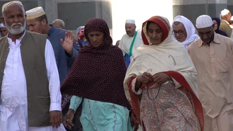 Foreign pilgrims leave Prophet's Mosque after prayer in Medina, Saudi Arabia Stock-Footage 125838529