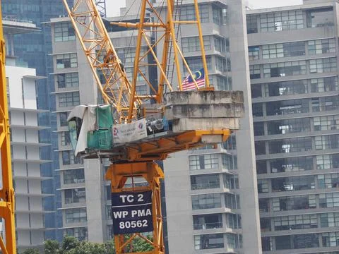 Foreign workers are working in a construction site Stock Photos