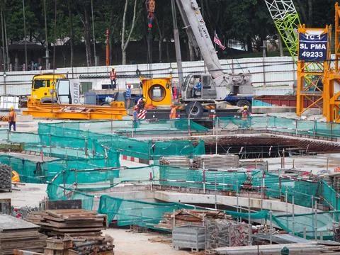 Foreign workers are working in a construction site Stock-Fotos