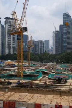Foreign workers are working in a construction site Stock Photos