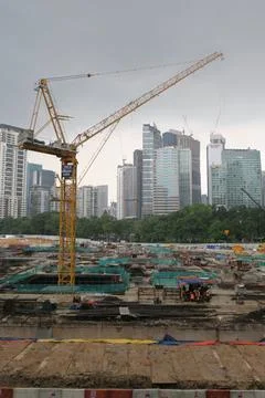 Foreign workers are working in a construction site Stock Photos