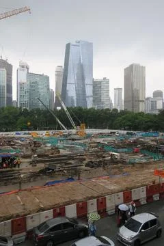 Foreign workers are working in a construction site Stock Photos