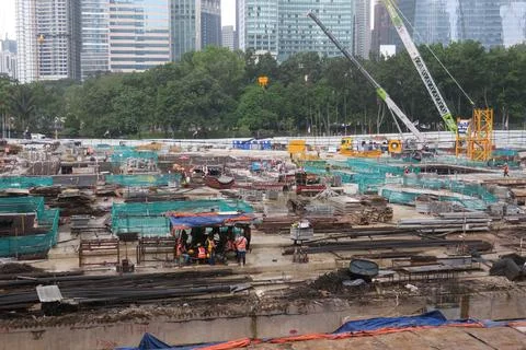 Foreign workers are working in a construction site Stock Photos