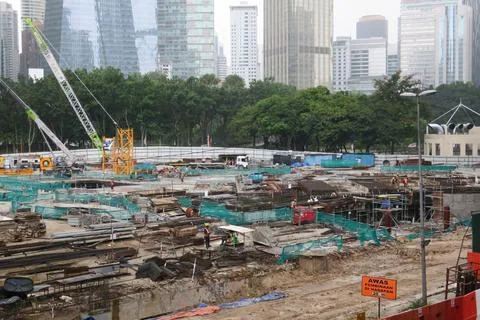 Foreign workers are working in a construction site Stock Photos