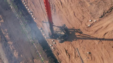 Foreman and builders on the construction site. In the center of the zone there Stock Footage 157756656