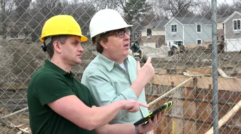 Foreman and construction worker onsite Stock Footage 49086382