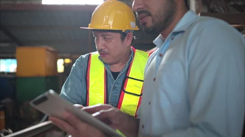Foreman and worker on construction crane inspection Stock Footage 291849550