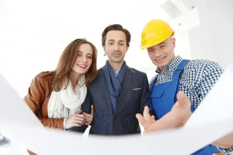 Foreman with blueprint Stock Photos