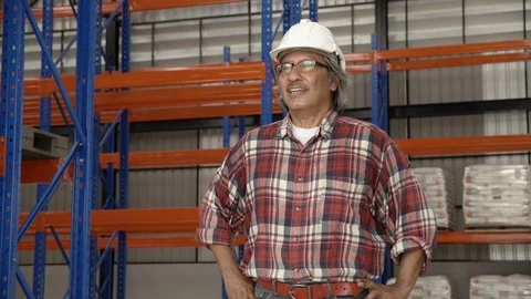 Foreman for checking parcels of goods From the delivery staff. Safety helmets Stock-Footage 126566663
