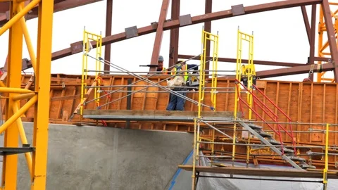 Foreman checks work of construction worker Stock Footage 90371957