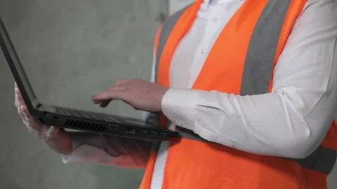 Foreman at a construction site with a laptop. Stock Footage 188135560