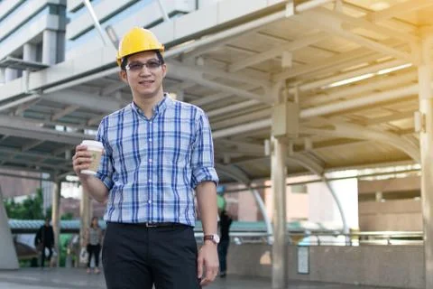 Foreman construction worker holding blueprint Stock Photos