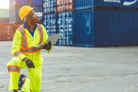 Foreman Containers Cargo Control Loading Staff with laptop computer black wor Stock Photos