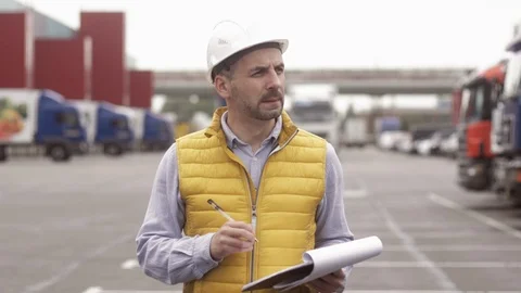 Foreman control loading Containers box to truck for Logistic Import Export Stock Footage 111481630