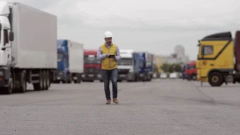 Foreman control loading Containers box to truck for Logistic Import Export Stock Footage 111484411