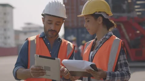 Foreman control loading Containers box of cargo  planning and explain work Stock Footage 149308731