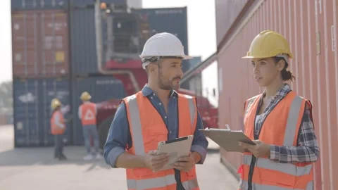 Foreman control loading Containers box of cargo planning and explain work Stock Footage 149308732