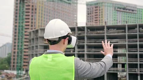 Foreman exploring building site in virtual reality Stock Photos