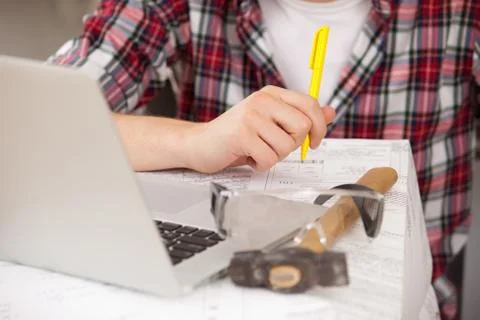 Foreman hands with pen Stock Photos