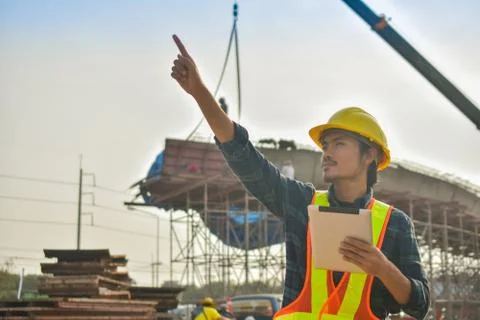 Foreman holding tablet use technology inspection control construction archite Stock Photos