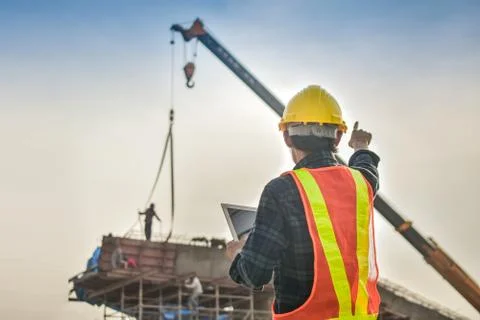 Foreman holding tablet use technology inspection control construction archite Stock Photos