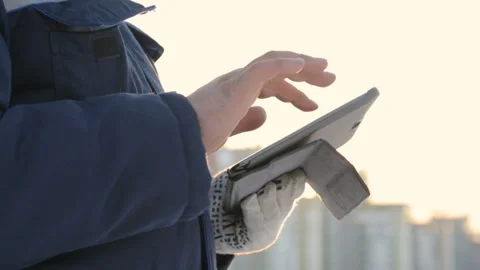 Foreman with pad at major construction project Video stock 86929949