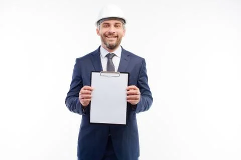 Foreman shows notepad on camera on a white background Stock Photos