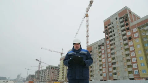 Foreman with tablet at major construction project Stock Footage 86927856