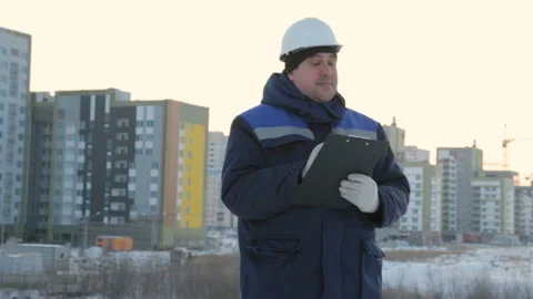 Foreman with tablet at major construction project Stock Footage 86929861
