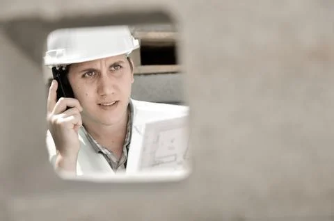 Foreman using walkie-talkie on construction site Stock-Fotos