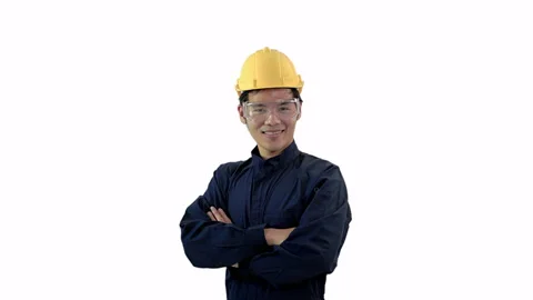 Foreman wearing a construction hat isolated on white background Stock Footage 133694535