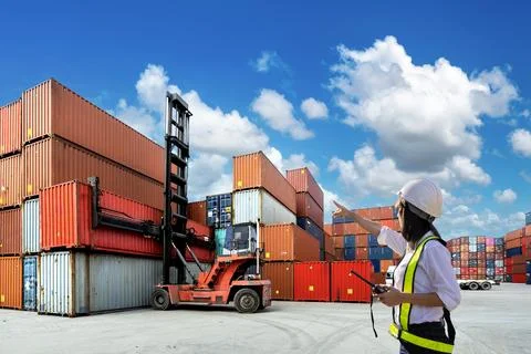 Foreman Woman control loading Containers box Stock Photos