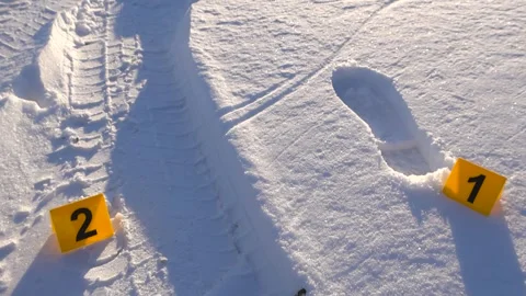 Forensic Evidence Markers With Boot Print And Vehicle Tire Mark Imprint In Stock Footage 327400142