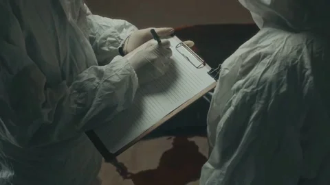 Forensic Experts Document Crime Scene Evidence at Night Stock Footage 321036279