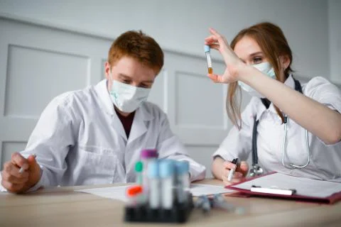 Forensic lab tests and two doctors Stock Photos