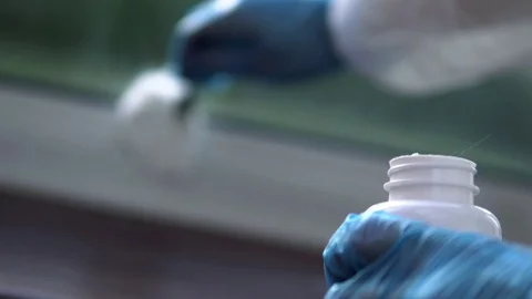 Forensic scientist collecting fingerprint traces from the window at crime scene Stock Footage 110714157