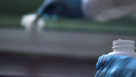 Forensic scientist collecting fingerprint traces from the window at crime scene Stock Footage 110714185