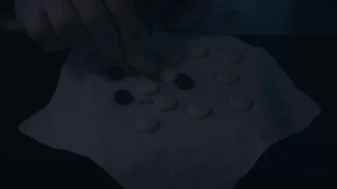 Forensic Scientist Hand In Glove Examining Assorted Pills Evidence Stock Footage 322606099