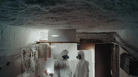 Forensic team assesses contamination in icy home environment. Scientists Stock Footage 346521236