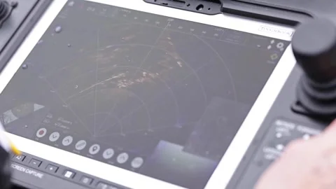 Forensic technician analyzing data received from underwater robot on computer Stockbeeldmateriaal 271338140