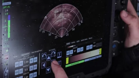 Forensic technician operating underwater robot from laptop computer Stock Footage 270715784