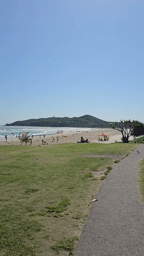Foreshore Path toward Cape Byron, Byron Bay, Australia – Vertical 8K Video stock 299035462