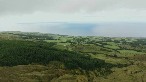 Forest and Pastures Sloping to the Atlantic on Sao Miguel Stock Footage 347125349