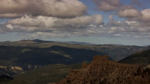 Forest and red rock clouds timelapse Stock Footage 98342106