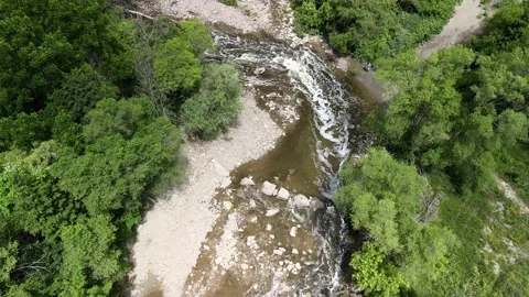 Forest and river stream view from above beautiful summer day Stockbeeldmateriaal 133643010
