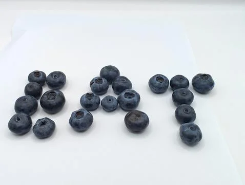 Forest berries on a white background Stock Photos