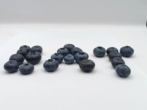 Forest berries on a white background Stock Photos