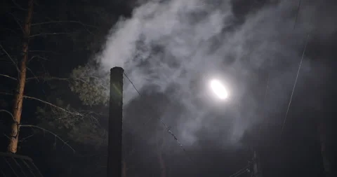 Forest Chimney Smoke at Night Stock-Footage 147542345